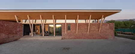 Casa Muros Curvos